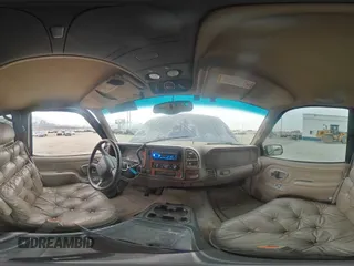 1999 GMC Suburban z VIN 1GDFK16R9XJ771458, wystawiony jako Copart lot #43412175 z przebiegiem 159 328 mil mil oraz Szkody całkowita. Historia ofert i sprzedaży dostępna na DreamBid. Obrazek 13.
