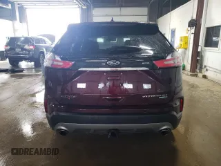2020 Ford Edge Titanium z VIN 2FMPK4K9XLBA59857, wystawiony jako Copart lot #63559295 z przebiegiem Nie podano mil oraz Szkoda całkowita • Salvage title. Historia ofert i sprzedaży dostępna na DreamBid. Obrazek 6.
