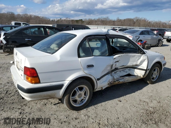 1997 Toyota Tercel DX z VIN JT2BC52L5V0215622, wystawiony jako Copart lot #87475544 z przebiegiem 382 242 mil mil oraz Szkoda całkowita • Salvage title. Historia ofert i sprzedaży dostępna na DreamBid. Obrazek 3.