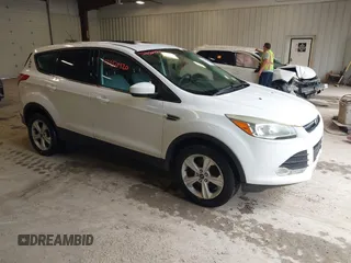 2014 Ford Escape SE z VIN 1FMCU9G92EUC28765, wystawiony jako IAAI lot #42450420 z przebiegiem 185 746 mil mil oraz . Historia ofert i sprzedaży dostępna na DreamBid. Obrazek 1.