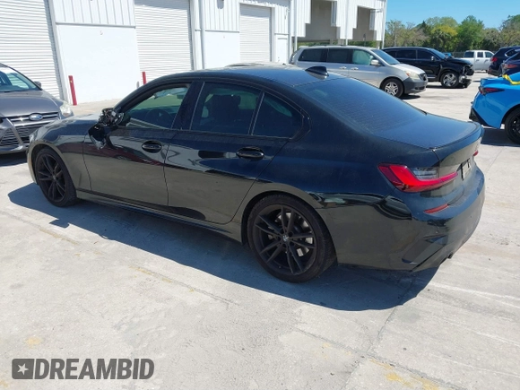 2022 BMW 3 Series 330i with VIN 3MW5R1J08N8C38592, listed as a IAAI auction lot 41832394 with 48,980 mi miles. Bid and sale history available at carsss.com. Image 3.