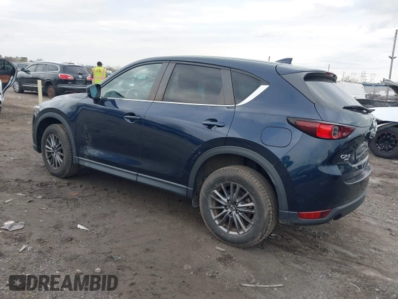 2021 Mazda CX-5 Touring with VIN JM3KFBCM1M1336457, listed as a IAAI auction lot 42034330 with 39,910 mi miles. Bid and sale history available at carsss.com. Image 3.