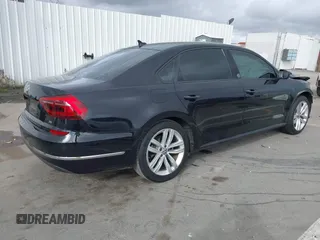 2019 Volkswagen Passat 2.0T Wolfsburg Edition with VIN 1VWLA7A34KC012887, listed as a IAAI auction lot 41792604 with 70,237 mi miles. Bid and sale history available at carsss.com. Image 4.