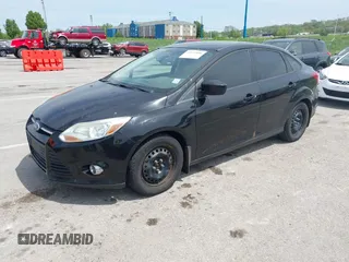 2012 Ford Focus SE with VIN 1FAHP3F24CL275128, listed as a IAAI auction lot 42121816 with 200,716 mi miles and . Bid and sale history available at carsss.com. Image 2.