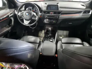 2018 BMW X1 xDrive28i with VIN WBXHT3C30J5L33646, listed as a Copart auction lot 46707525 with 82,656 mi miles and Salvage Title. Bid and sale history available at carsss.com. Image 8.
