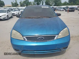 2007 Ford Focus S z VIN 1FAFP31N77W138844, wystawiony jako Copart lot #60702195 z przebiegiem Nie podano mil oraz Czysty tytuł • Clean title. Historia ofert i sprzedaży dostępna na DreamBid. Obrazek 5.