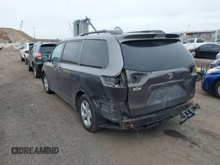 2015 Toyota Sienna LE AAS with VIN 5TDKK3DC7FS619418, listed as a IAAI auction lot 42553836 with 116,190 mi miles and . Bid and sale history available at DreamBid. Image 3.