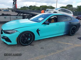 2022 BMW M8 Competition with VIN WBSGV0C03NCJ35595, listed as a IAAI auction lot 41527027 with 12,436 mi miles. Bid and sale history available at carsss.com. Image 2.