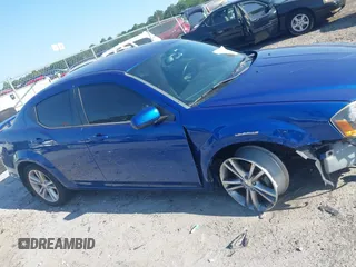 2014 Dodge Avenger SXT z VIN 1C3CDZCG7EN201911, wystawiony jako IAAI lot #42323606 z przebiegiem 149 714 mil mil oraz . Historia ofert i sprzedaży dostępna na DreamBid. Obrazek 13.