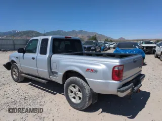 2003 Ford Ranger XL Fleet with VIN 1FTZR45E93PB55618, listed as a Copart auction lot 58780015 with 82,839 mi miles and Salvage title. Bid and sale history available at DreamBid. Image 2.