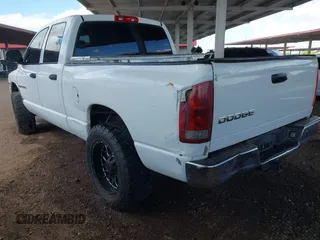 2005 Dodge 1500 SLT with VIN 1D7HU18DX5J582118, listed as a IAAI auction lot 42026954 with 320,123 mi miles. Bid and sale history available at carsss.com. Image 3.