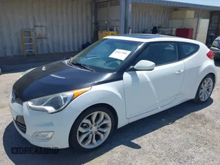 2014 Hyundai Veloster RE:FLEX with VIN KMHTC6AD7EU214911, listed as a IAAI auction lot 42617066 with 115,521 mi miles and . Bid and sale history available at DreamBid. Image 2.