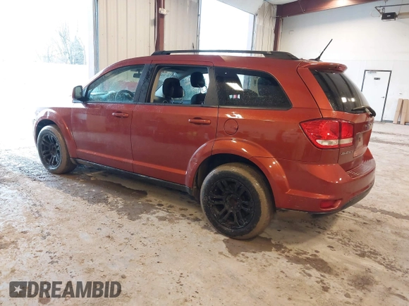 2013 Dodge Journey SXT with VIN 3C4PDCBG1DT674911, listed as a IAAI auction lot 41713407 with 153,757 mi miles and . Bid and sale history available at DreamBid. Image 3.