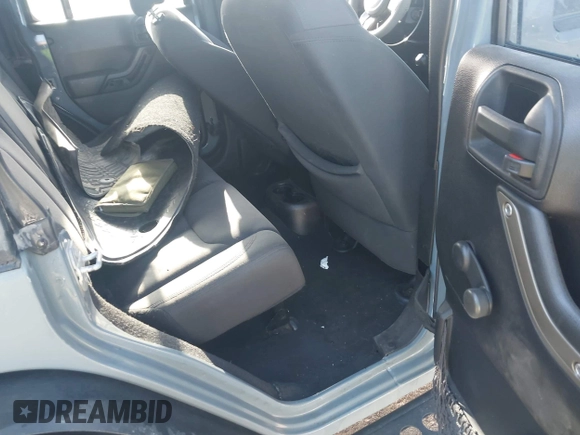 2015 Jeep Wrangler Unlimited Sport с VIN 1C4BJWDG6FL774275, выставлен на аукционе IAAI как лот 41984611 с пробегом 113 726 миль миль и . История ставок и продаж доступна на DreamBid. Изображение 8.