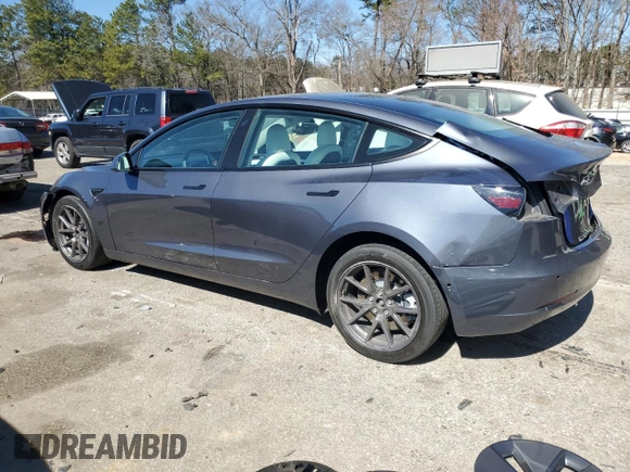 2022 Tesla Model 3 with VIN 5YJ3E1EA5NF339769, listed as a Copart auction lot 47111685 with 44,087 mi miles and Salvage Title. Bid and sale history available at DreamBid. Image 2.