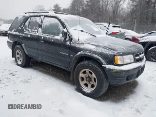 2000 Isuzu Rodeo S with VIN 4S2CK58W7Y4356886, listed as a IAAI auction lot 41586236 with 239,777 mi miles. Bid and sale history available at carsss.com. Image 1.