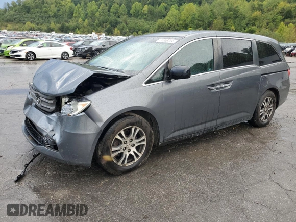 2012 Honda Odyssey EX-L with VIN 5FNRL5H64CB035196, listed as a Copart auction lot 71566704 with 243,529 mi miles and Salvage Title. Bid and sale history available at carsss.com. Image 1.