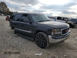 2004 GMC Yukon SLE with VIN 1GKEK13V74J331675, listed as a Copart auction lot 82057724 with 238,550 mi miles and Clean Title. Bid and sale history available at carsss.com. Image 4.