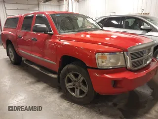 2008 Dodge Dakota Laramie with VIN 1D7HW58N58S534499, listed as a IAAI auction lot 41528141 with 127,340 mi miles. Bid and sale history available at carsss.com. Image 1.