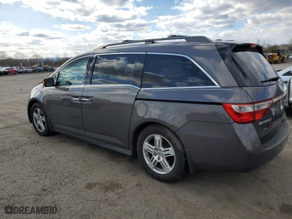 2013 Honda Odyssey Touring with VIN 5FNRL5H96DB010599, listed as a Copart auction lot 52316325 with 179,840 mi miles and Salvage Title. Bid and sale history available at carsss.com. Image 2.