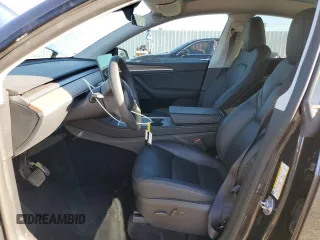 2024 Tesla Model Y with VIN 7SAYGDED3RF151031, listed as a Copart auction lot 49494165 with 7,503 mi miles and Salvage Title. Bid and sale history available at DreamBid. Image 7.