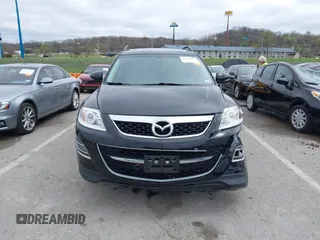 2011 Mazda CX-9 Grand Touring z VIN JM3TB2DAXB0300466, wystawiony jako IAAI lot #41921411 z przebiegiem 196 257 mil mil oraz . Historia ofert i sprzedaży dostępna na DreamBid. Obrazek 12.