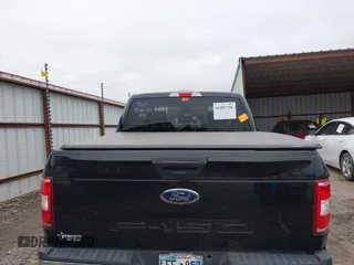 2018 Ford F-150 XL with VIN 1FTEW1EB0JKD85702, listed as a IAAI auction lot 41207356 with 136,528 mi miles. Bid and sale history available at carsss.com. Image 15.