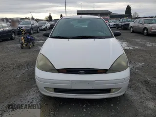 2003 Ford Focus ZX3 with VIN 3FAFP31Z83R182271, listed as a Copart auction lot 82415004 with 211,193 mi miles and Salvage title. Bid and sale history available at DreamBid. Image 5.
