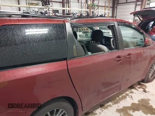 2015 Toyota Sienna LE AAS with VIN 5TDKK3DC8FS655876, listed as a IAAI auction lot 42298949 with 93,459 mi miles and . Bid and sale history available at DreamBid. Image 6.
