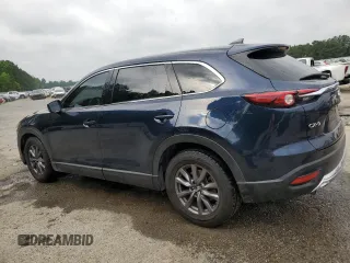 2021 Mazda CX-9 Touring with VIN JM3TCACY2M0512867, listed as a Copart auction lot 56646615 with 92,566 mi miles and Salvage title. Bid and sale history available at DreamBid. Image 2.