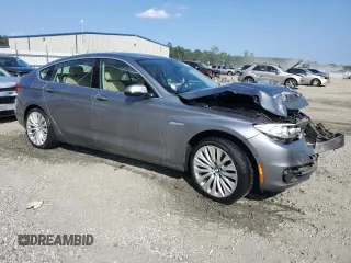 2014 BMW 5 Series GT 535i with VIN WBA5M2C58ED085437, listed as a Copart auction lot 68614494 with 91,917 mi miles and Salvage Title. Bid and sale history available at carsss.com. Image 4.