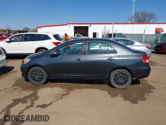 2009 Toyota Yaris with VIN JTDBT903194047784, listed as a IAAI auction lot 42049872 with 115,735 mi miles. Bid and sale history available at carsss.com. Image 14.