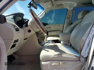 2016 Infiniti QX80 z VIN JN8AZ2NE7G9125016, wystawiony jako Copart lot #58667665 z przebiegiem 114 655 mil mil oraz Szkoda całkowita • Salvage title. Historia ofert i sprzedaży dostępna na DreamBid. Obrazek 7.