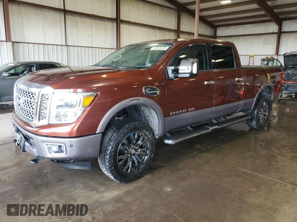 2016 Nissan Titan Platinum Reserve with VIN 1N6BA1F45GN507363, listed as a Copart auction lot 53625635 with 95,450 mi miles and Salvage title. Bid and sale history available at DreamBid. Image 1.