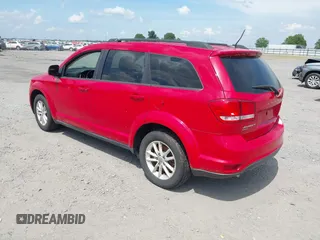 2013 Dodge Journey SXT with VIN 3C4PDDBGXDT641427, listed as a IAAI auction lot 42604902 with 149,256 mi miles and . Bid and sale history available at DreamBid. Image 3.