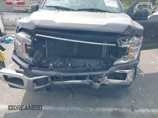 2020 Ford F-150 XL with VIN 1FTEW1C46LKD28184, listed as a IAAI auction lot 42071631 with 131,629 mi miles and . Bid and sale history available at DreamBid. Image 6.