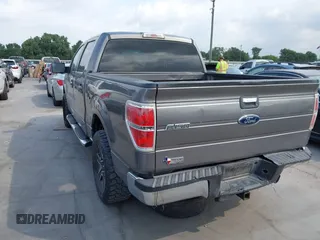 2014 Ford F-150 XL with VIN 1FTFW1CTXEKF35966, listed as a IAAI auction lot 42120360 with 140,174 mi miles and . Bid and sale history available at DreamBid. Image 3.
