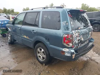 2007 Honda Pilot EX with VIN 2HKYF18437H528868, listed as a IAAI auction lot 41762030 with 203,212 mi miles. Bid and sale history available at carsss.com. Image 3.