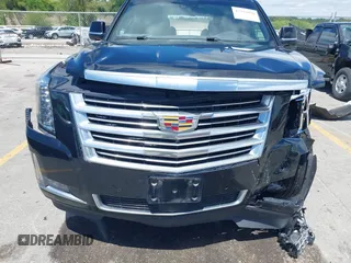 2015 Cadillac Escalade Platinum z VIN 1GYS4PKJ8FR568958, wystawiony jako IAAI lot #42316098 z przebiegiem 152 661 mil mil oraz . Historia ofert i sprzedaży dostępna na DreamBid. Obrazek 6.