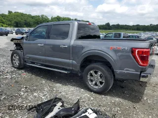 2021 Ford F-150 XL with VIN 1FTFW1EDXMFC91152, listed as a Copart auction lot 58350455 with 59,992 mi miles and Salvage title. Bid and sale history available at DreamBid. Image 2.