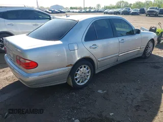2001 Mercedes-Benz E-Class with VIN WDBJF65J61B373135, listed as a IAAI auction lot 42149598 with 123,314 mi miles. Bid and sale history available at carsss.com. Image 4.
