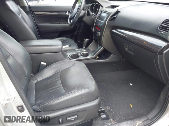 2012 Kia Sorento EX with VIN 5XYKUDA20CG206132, listed as a IAAI auction lot 42018015 with 138,158 mi miles. Bid and sale history available at carsss.com. Image 5.