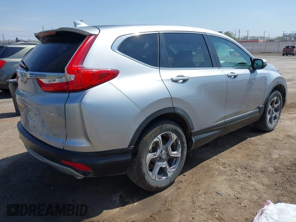 2018 Honda CR-V EX with VIN 7FARW2H59JE059539, listed as a IAAI auction lot 41895078 with 132,631 mi miles and . Bid and sale history available at DreamBid. Image 4.