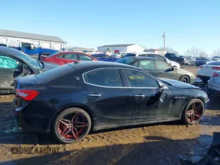 2014 Maserati Ghibli z VIN ZAM57XSA4E1090315, wystawiony jako IAAI lot #41423507 z przebiegiem 115 323 mil mil oraz . Historia ofert i sprzedaży dostępna na DreamBid. Obrazek 14.