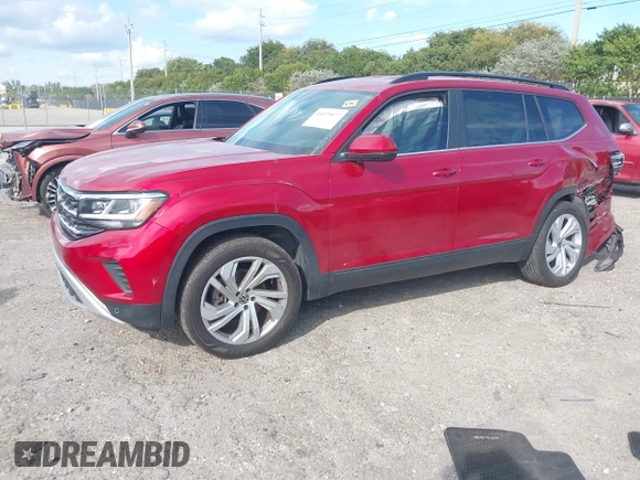 2021 Volkswagen Atlas SE z VIN 1V2WR2CA3MC526612, wystawiony jako IAAI lot #41625077 z przebiegiem 70 856 mil mil oraz . Historia ofert i sprzedaży dostępna na DreamBid. Obrazek 2.
