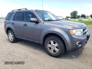 2012 Ford Escape XLT z VIN 1FMCU9D73CKA70061, wystawiony jako Copart lot #63571585 z przebiegiem 130 275 mil mil oraz Czysty tytuł • Clean title. Historia ofert i sprzedaży dostępna na DreamBid. Obrazek 4.