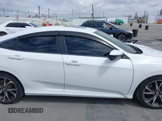 2019 Honda Civic Si z VIN 2HGFC1E58KH707715, wystawiony jako IAAI lot #42108131 z przebiegiem 126 044 mil mil oraz . Historia ofert i sprzedaży dostępna na DreamBid. Obrazek 14.