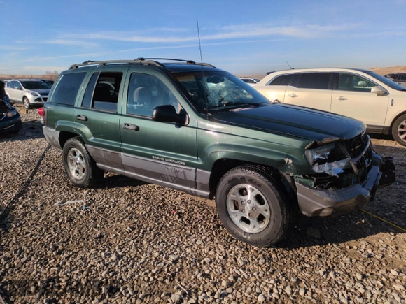 2001 Jeep Grand Cherokee Laredo with VIN 1J4GW48N21C570404, listed as a Copart auction lot 85996954 with 153,838 mi miles and Salvage title. Bid and sale history available at DreamBid. Image 4.