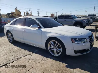 2015 Audi A8 с VIN WAUJGAFD3FN030568, выставлен на аукционе Copart как лот 75785923 с пробегом 83 911 миль миль и . История ставок и продаж доступна на DreamBid. Изображение 4.