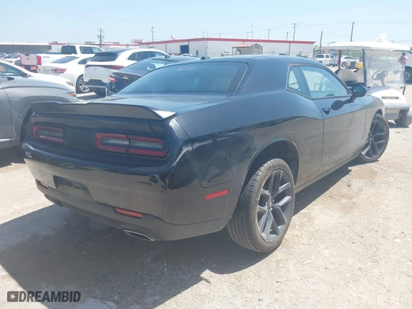 2023 Dodge Challenger SXT with VIN 2C3CDZAG3PH586933, listed as a IAAI auction lot 42001266 with 38,097 mi miles. Bid and sale history available at carsss.com. Image 4.